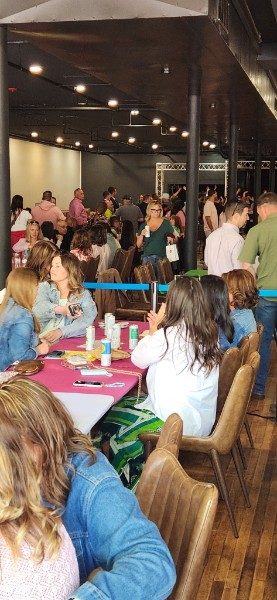 A packed crowd inside Sweet Caroline's, a new restaurant and bar in Old Town Winchester, Virginia